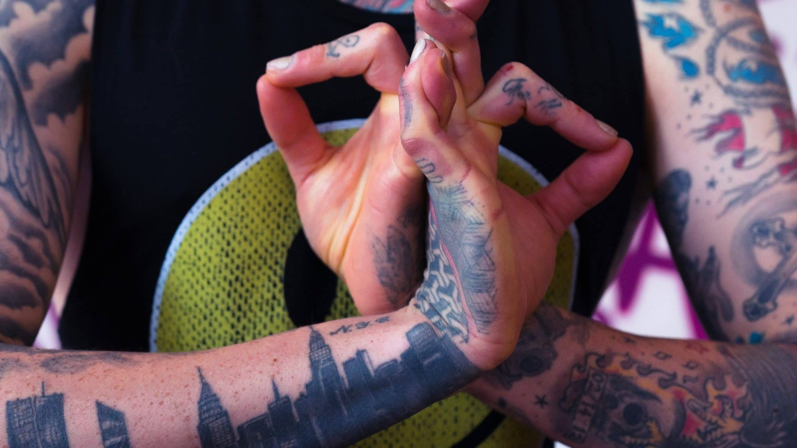 Premium Photo  Tattoo artist moisturizes the hand by spaying it with water  from a spray bottle